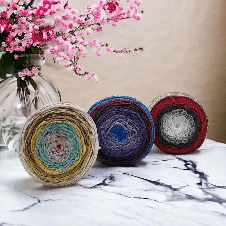 Cafune Cake Gradient koord, een gevlochten verloopkoord van 250 meter per bol