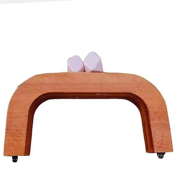 Houten tas frame met knoppen van acryl en een magnetisch sluiting. Geeft een vintage uitstralin