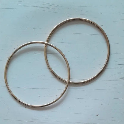 Metalen tas handvatten rond van 15cm. De kleur is goud. Per paar te koop bij hobbygaren.nl