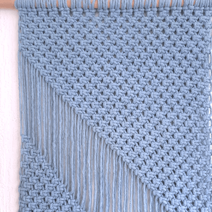 Close-up foto van een Macrame wandkleed 