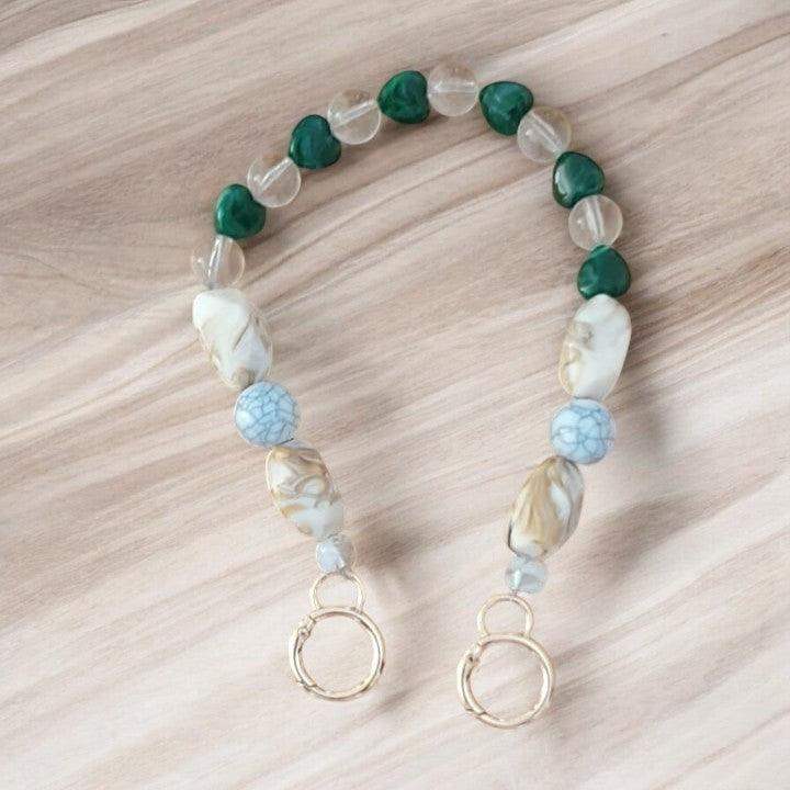 tashengsel-van-acryl-kralen-beige-groen-doorzichtig-hobbygaren